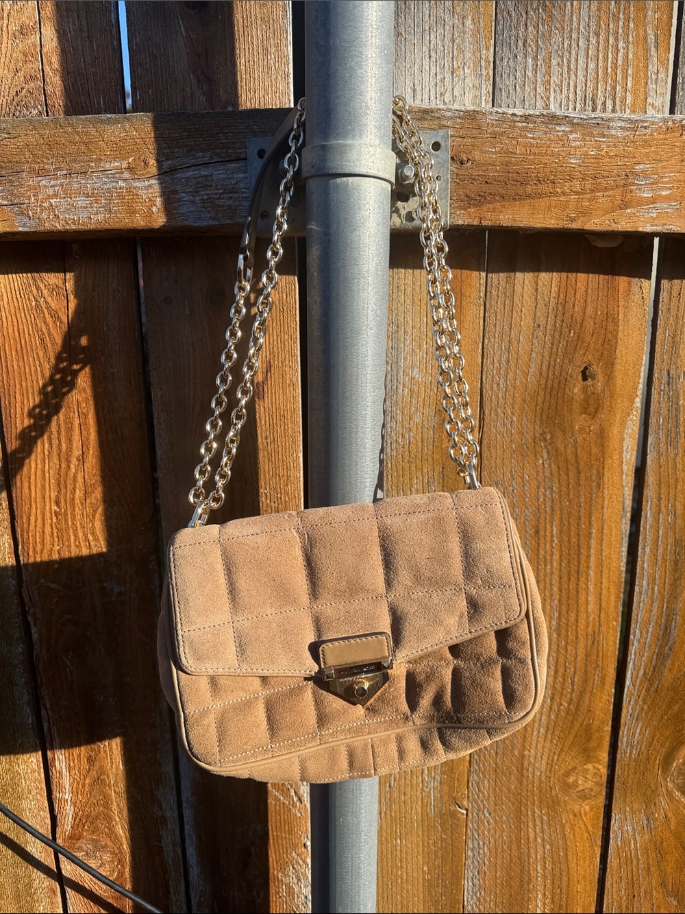 Michael Kors quilted shoulder bag.